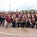 Dexter's softball team poses for a photo with their district championship trophy, Saturday, June 1.
Courtney Sacco I AnnArbor.com 